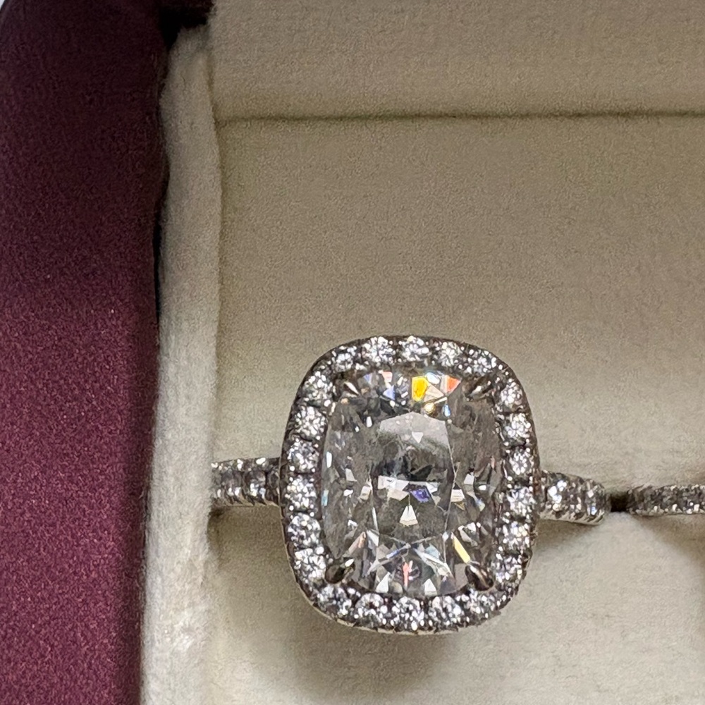 18 kt gold setting with diamonds . Center moissanite stone 3.5 carat